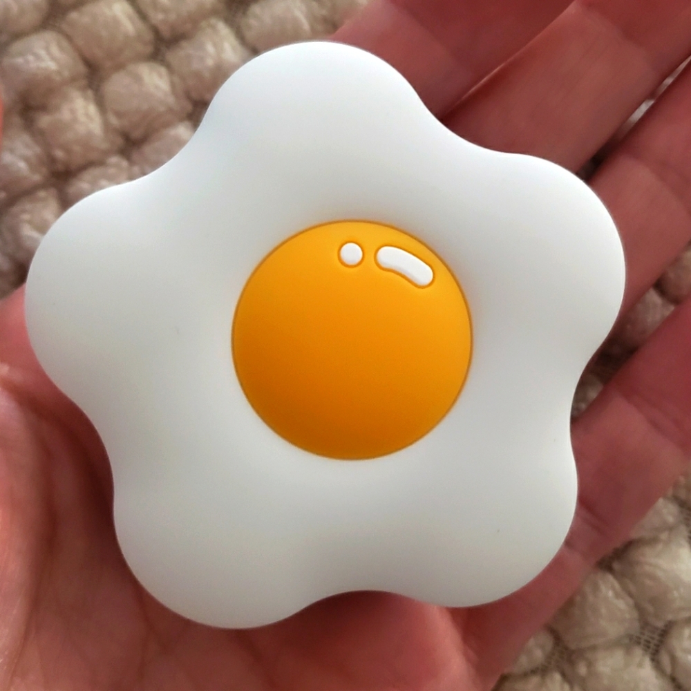 Egg shape phone stand